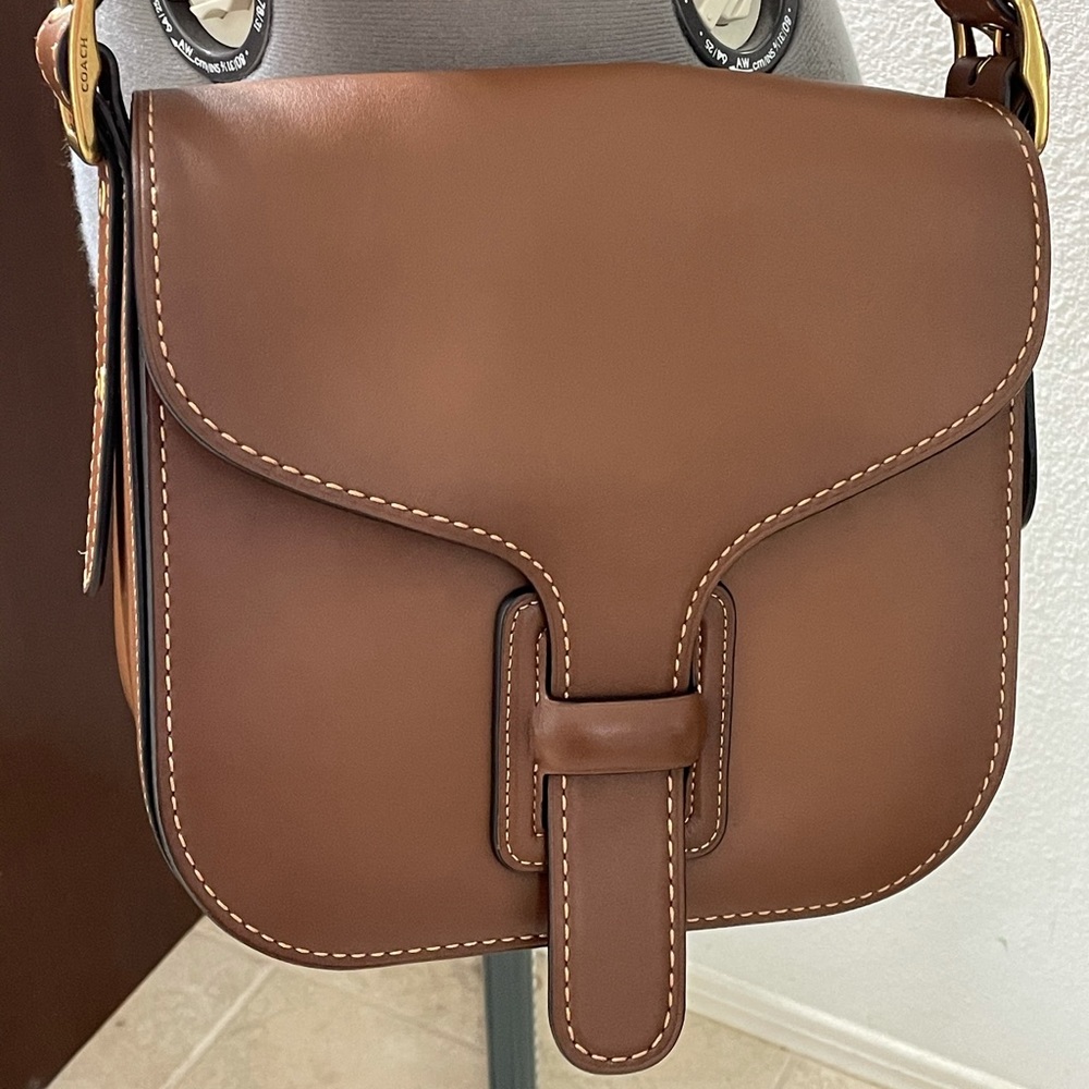 Brown Coach crossbody saddlebag